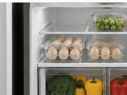 Obsoorth refrigerator organizers in a bright, orderly kitchen
